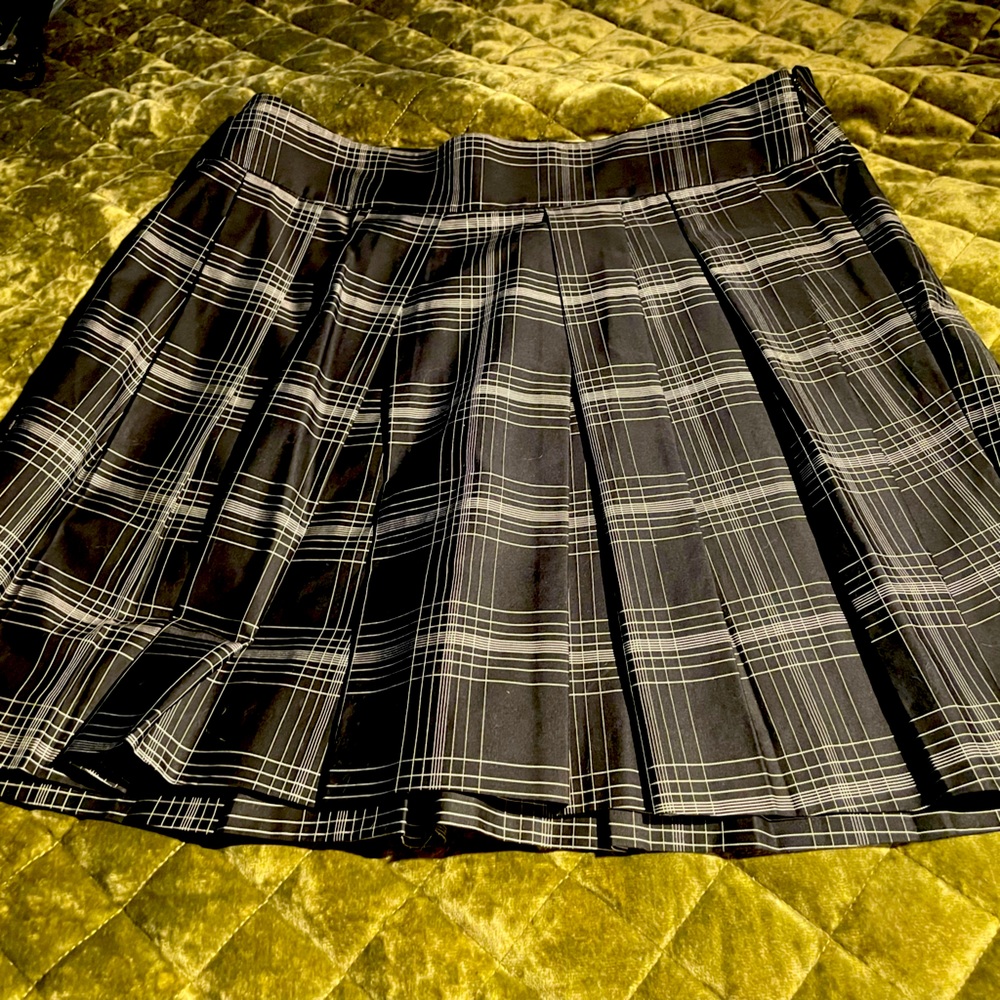 Black and white plaid skirt. Lightweight and looks great with tights.